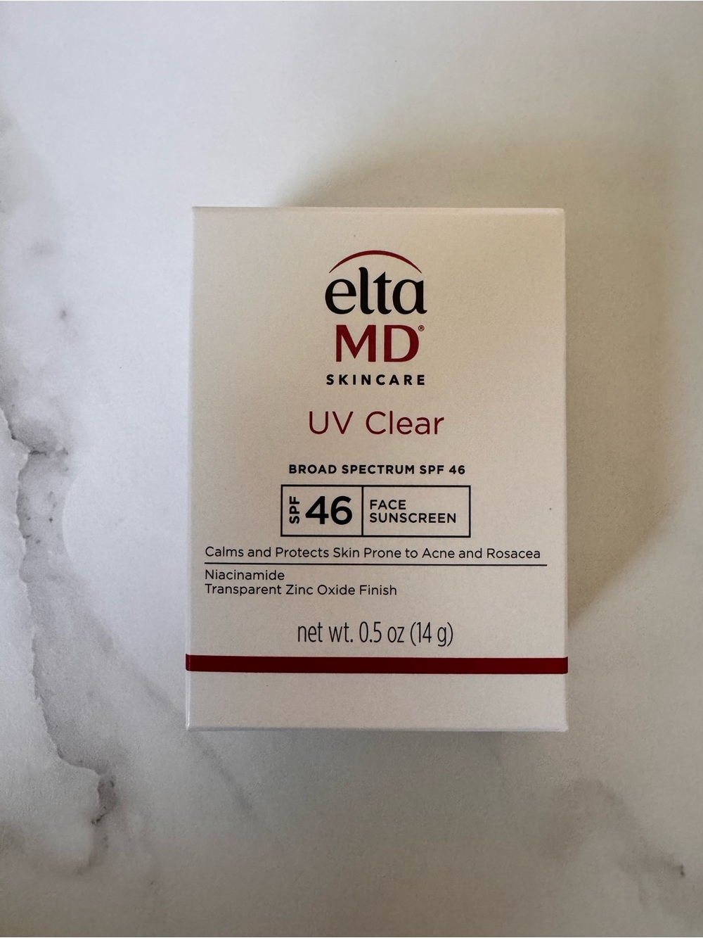 EltaMD UV Clear Face Sunscreen in White with Red Accents